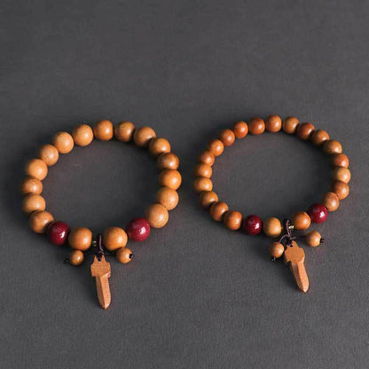 Buddha Stones Peach Wood Cinnabar Sword Charm Wealth Bracelet