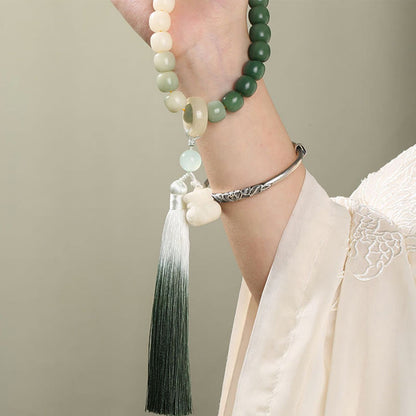 Buddha Stones Natural Gradient Bodhi Seed Fortune Money Bag Lotus Wisdom Tassel Wrist Mala