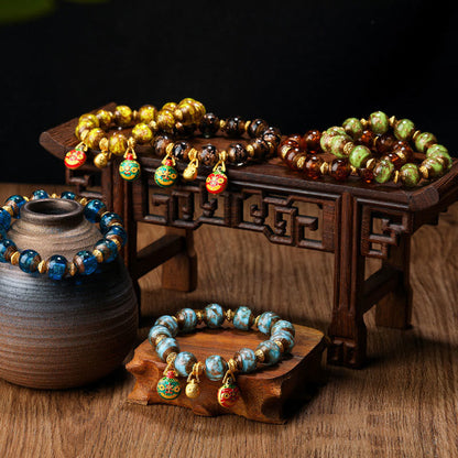 Buddha Stones Gold Swallowing Beast Family Charm Liuli Glass Bead Fortune Bracelet