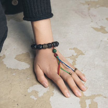 Buddha Stones Tibet Ebony Wood Copper Peace Tassel Wrist Mala Bracelet
